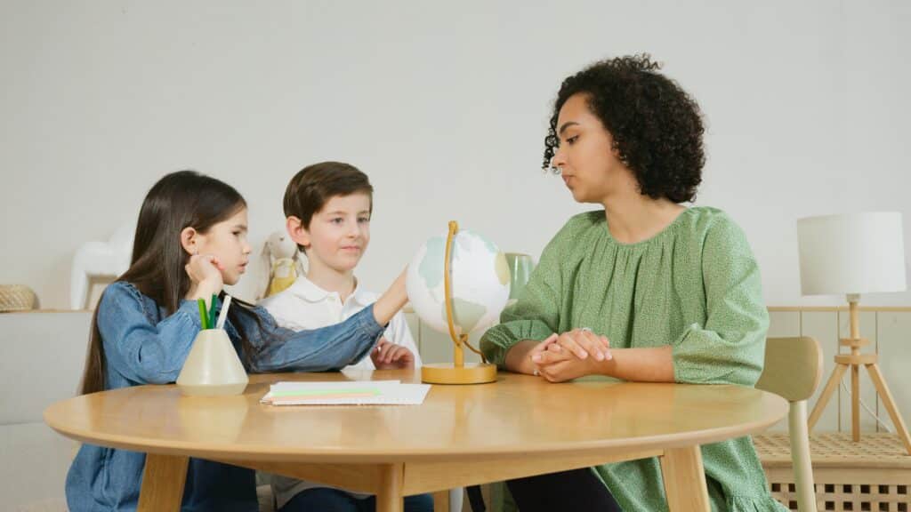 woman-and-kids-sitting-at-a-table