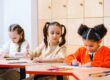 Children Studying Inside a Classroom