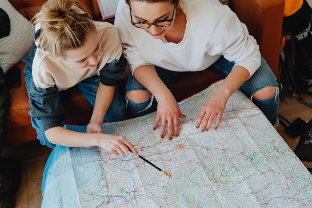 mother and daughter planning travel