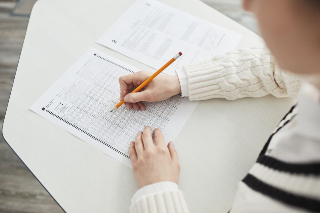 student filling out an exam