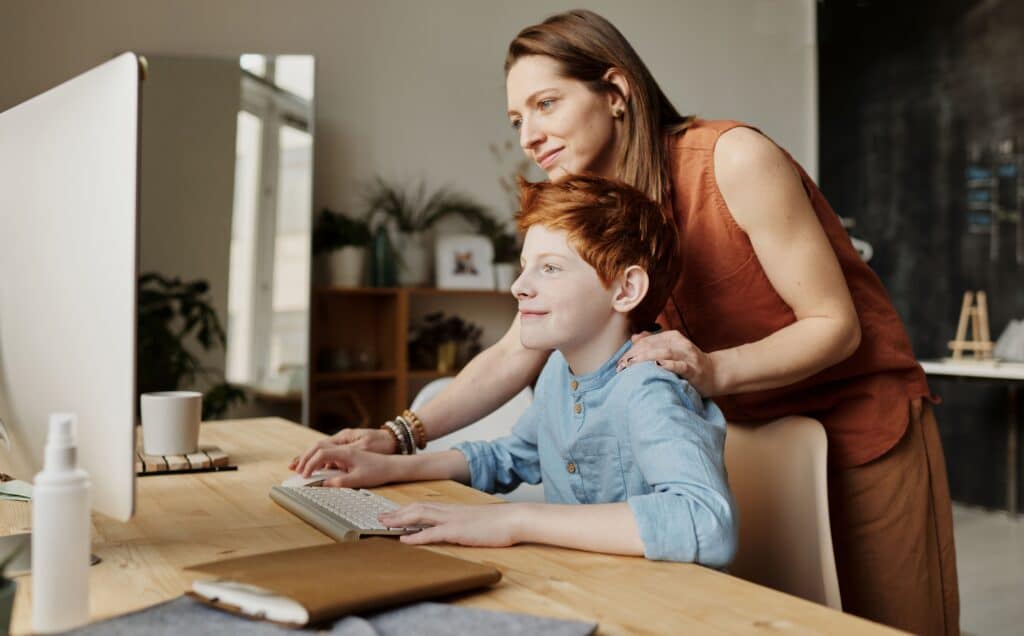 A mother checking-in on and her child studying